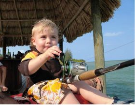 Placencia, Belize boy fishing – Best Places In The World To Retire – International Living